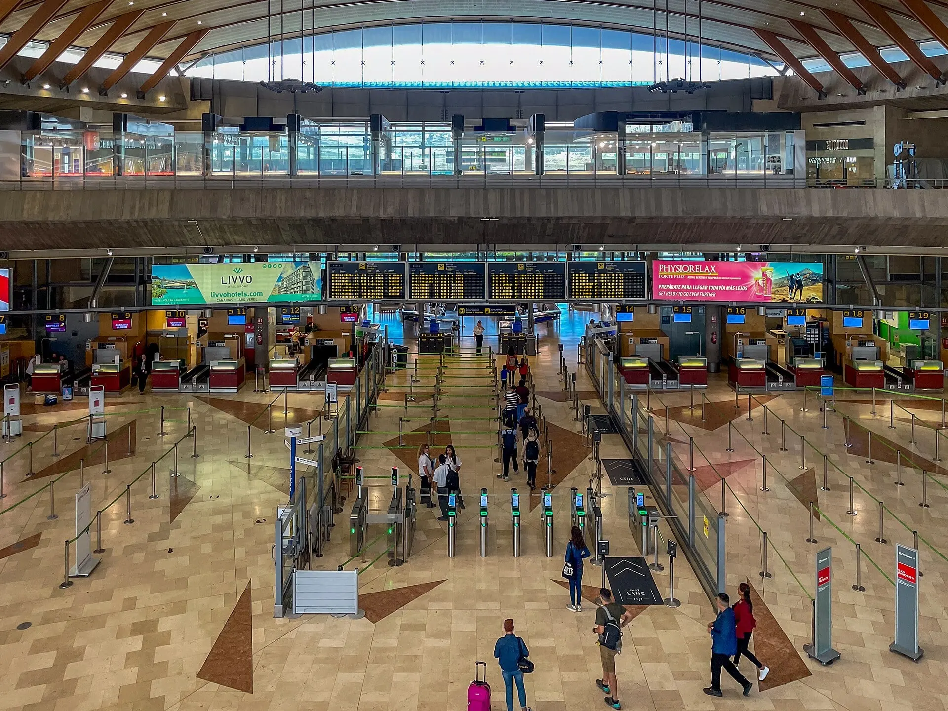 The check-in desks and security gates in the main hall at Tenerife North Airport