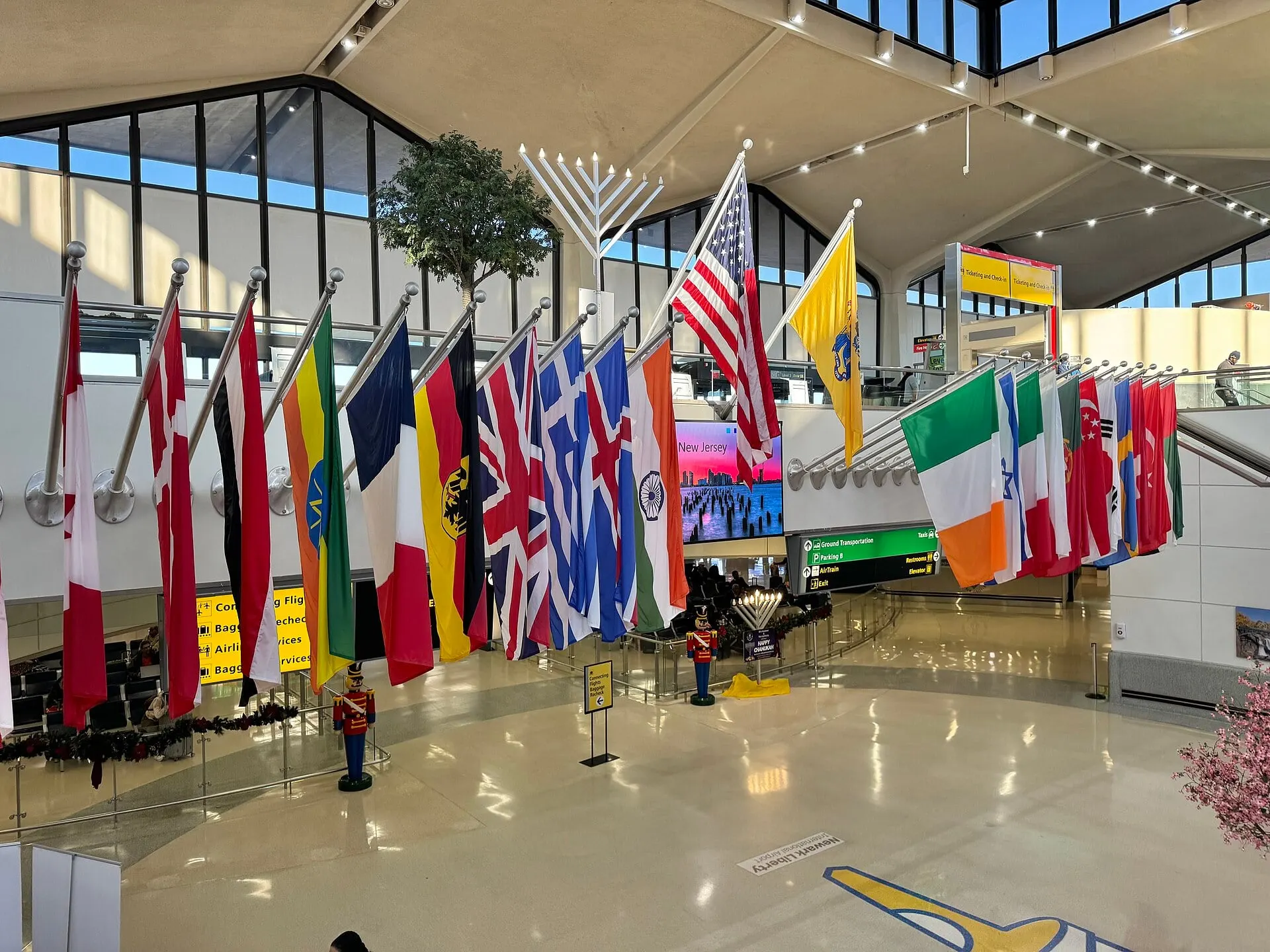 Flags of the countries served by Newark Liberty hanging in the Terminal B hall