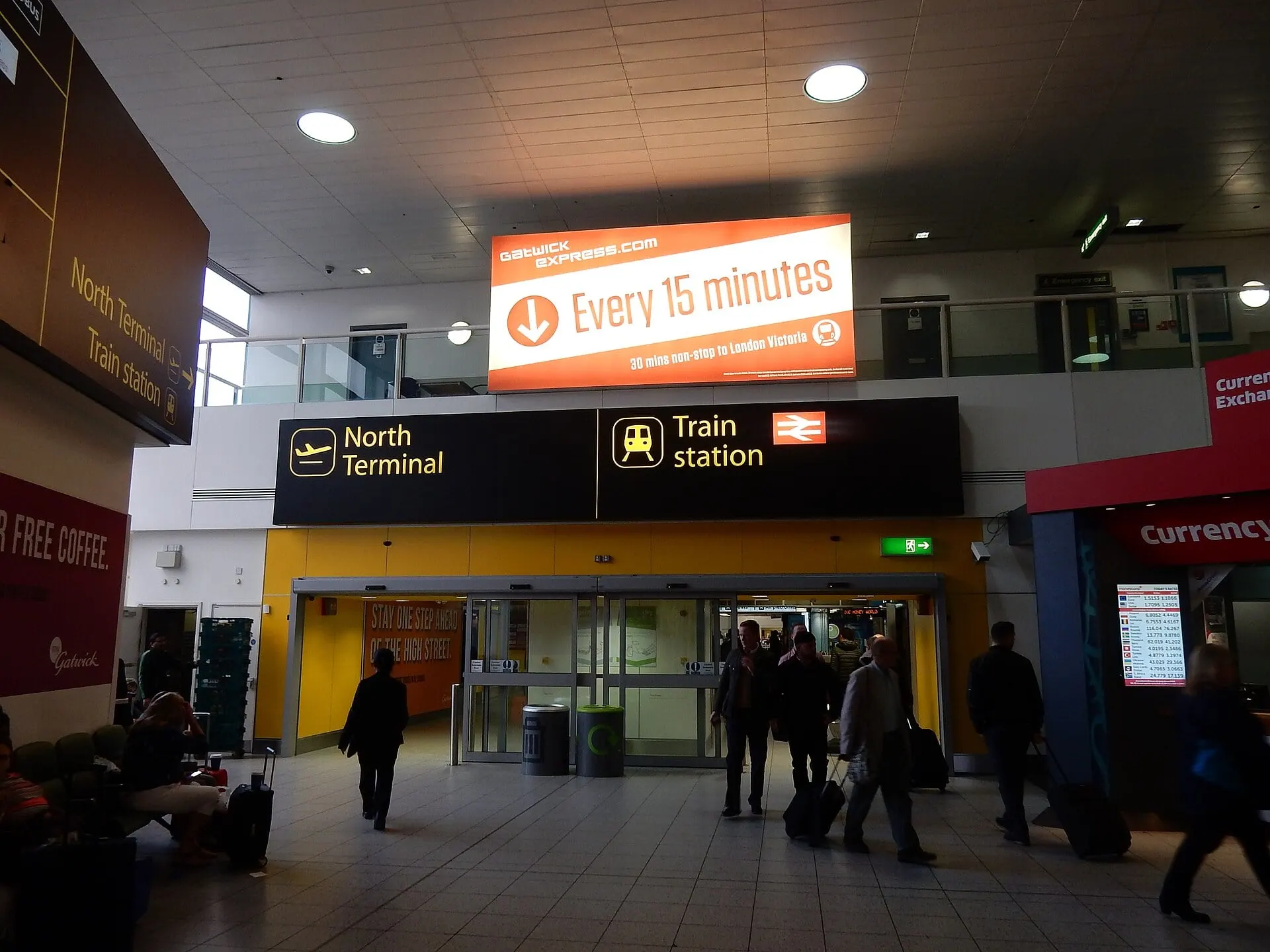 The way from Gatwick South Terminal into the railway station, with trains about every 4 minutes on average