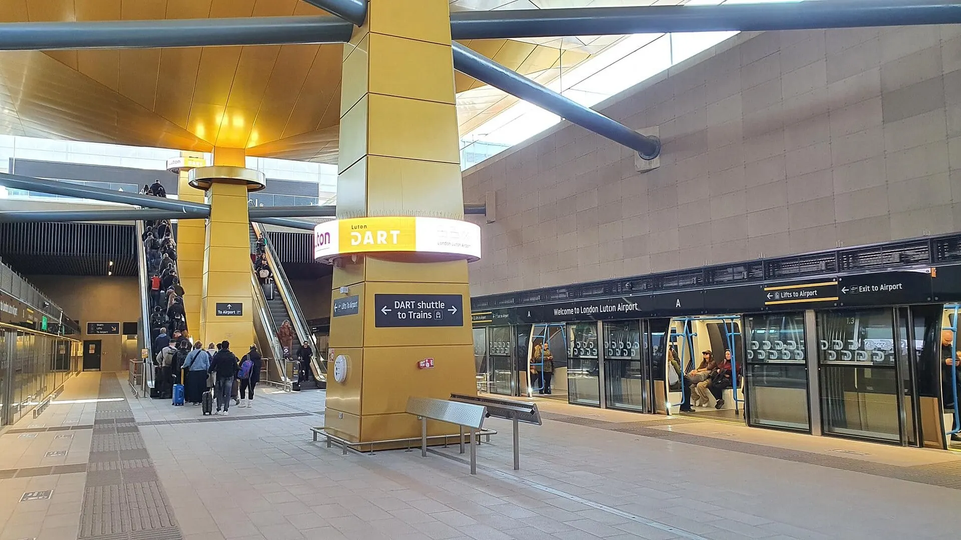 The DART platforms at the Luton Airport terminal station, behind glass screen doors