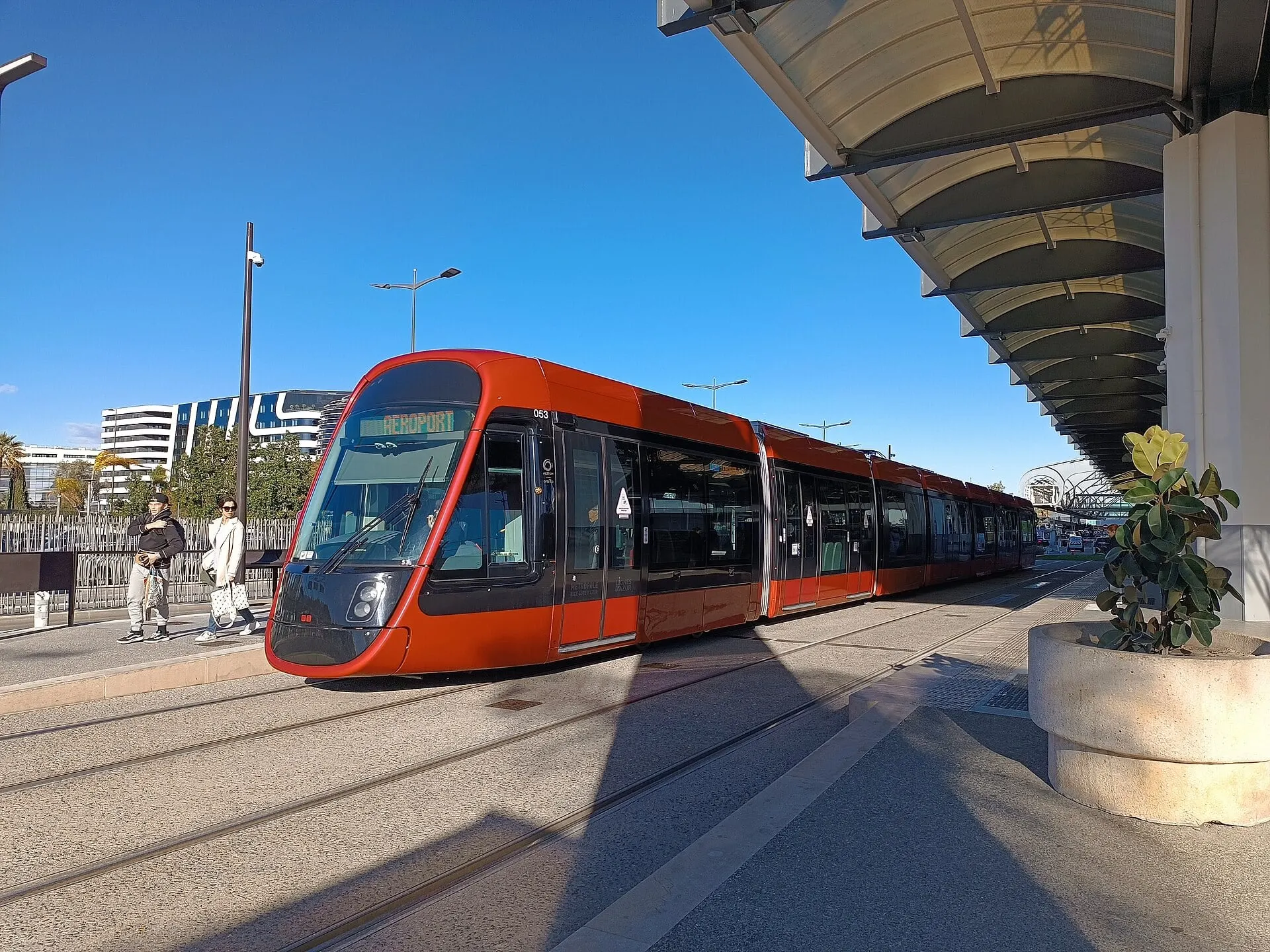 A Nice tram waiting at the airport stop beside the terminal at Nice Côte d'Azur Airport