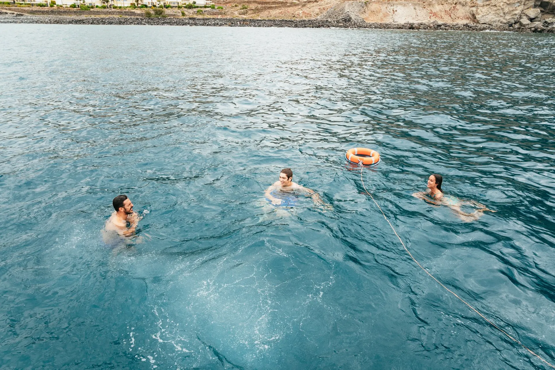 Swimmers in the clear water at the swim stop