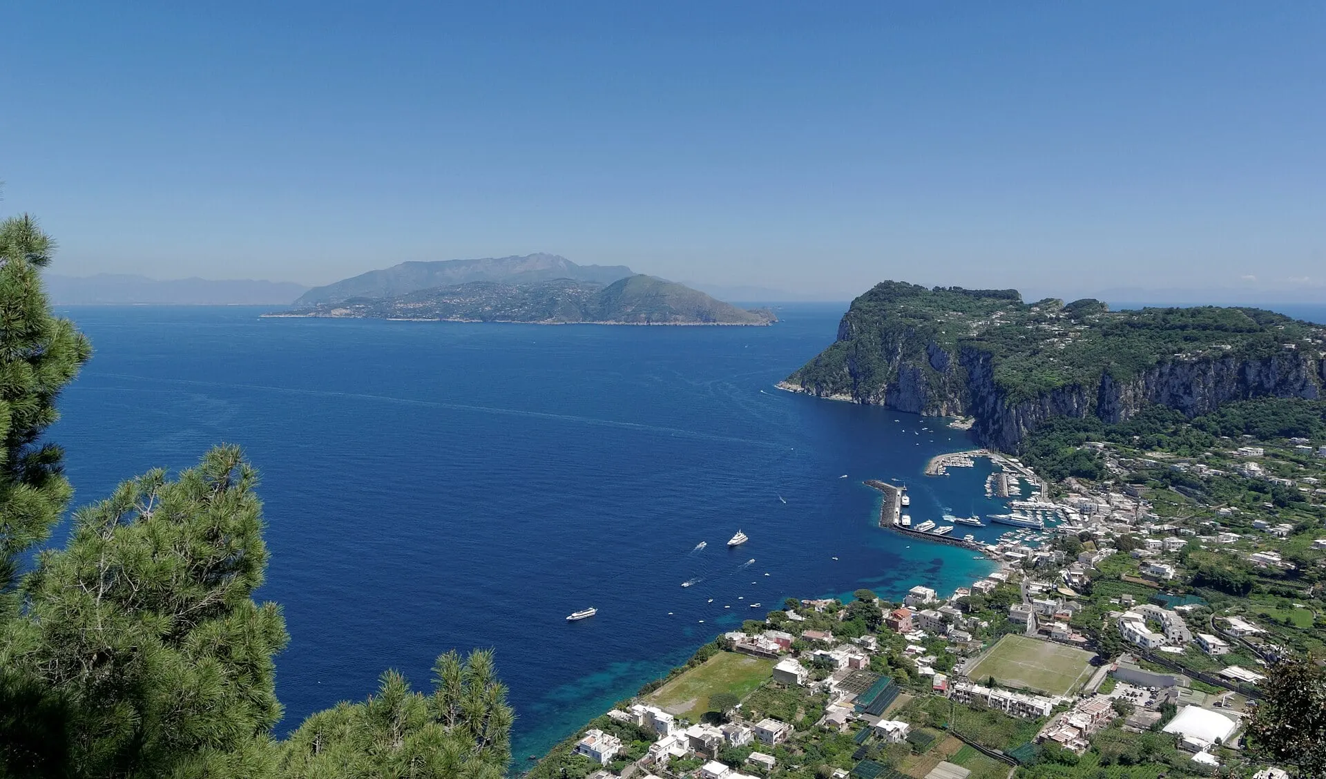 Capri's harbour and coast seen from above Anacapri