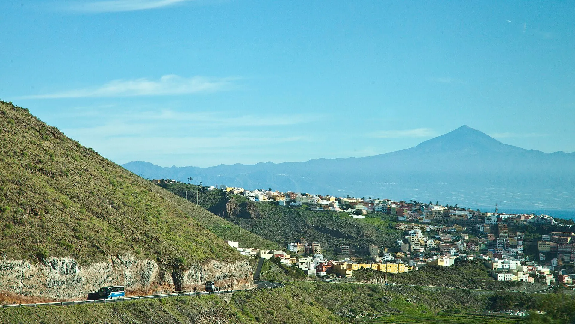 Teide on Tenerife rising across the sea behind the houses of San Sebastián de La Gomera.