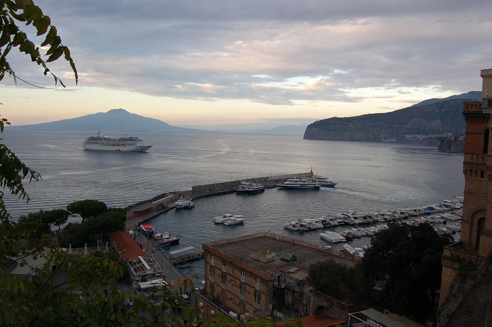Sorrento's Marina Grande at sunset with Vesuvius across the bay